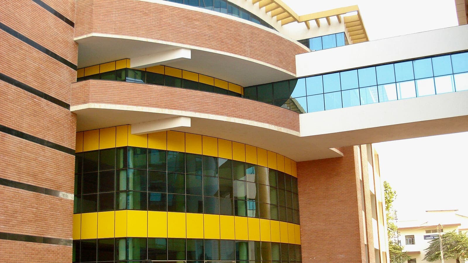 The modern glass and terracotta academic building of Manipal Institute of Technology