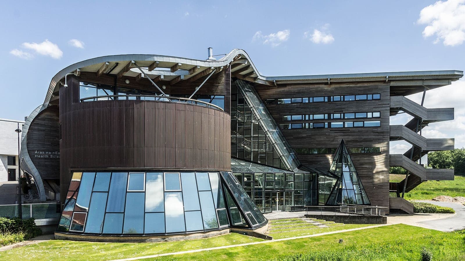 A modern glass and timber building on the University of Limerick campus