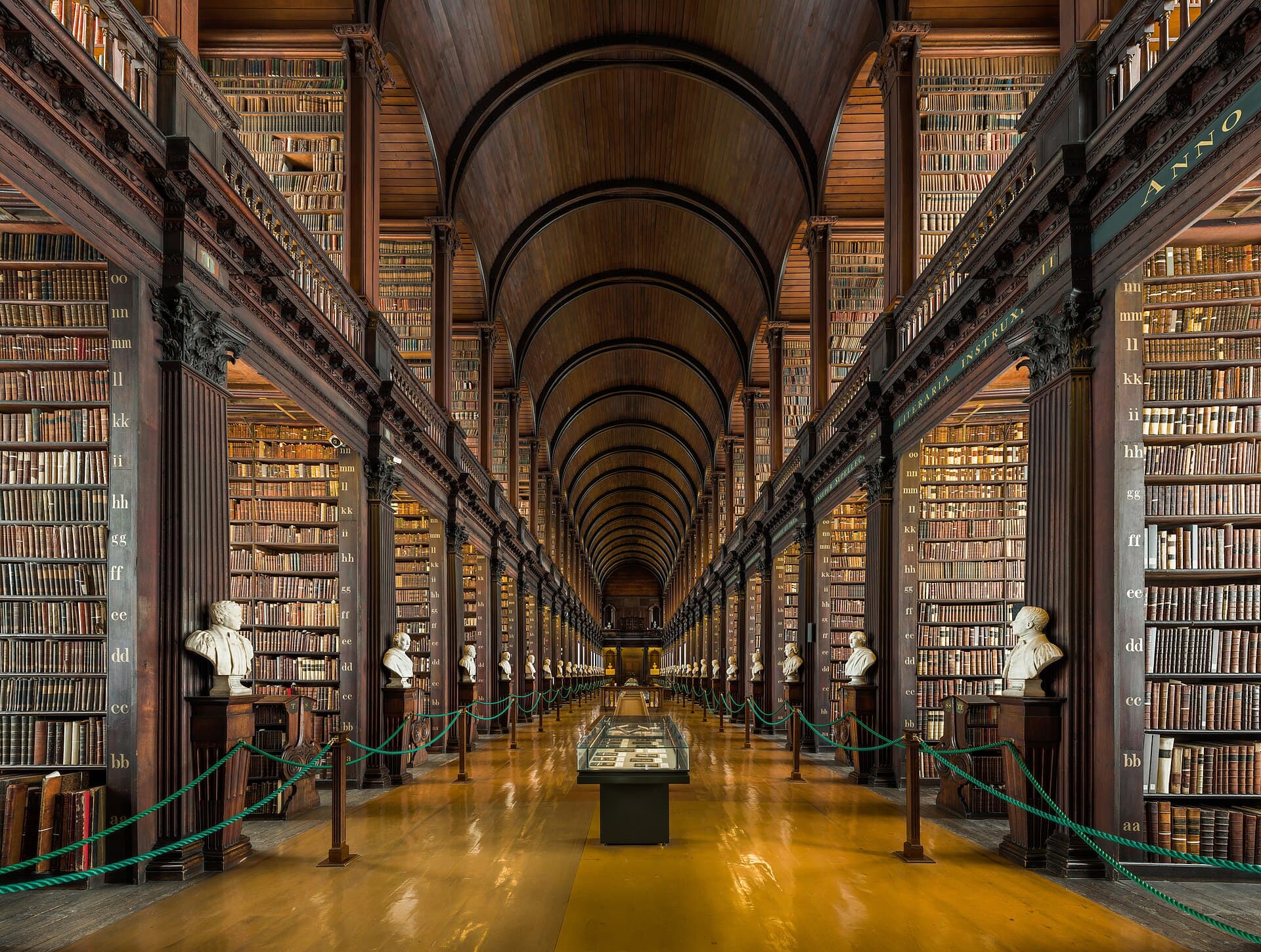 The Long Room library at Trinity College Dublin, lined with books and marble busts